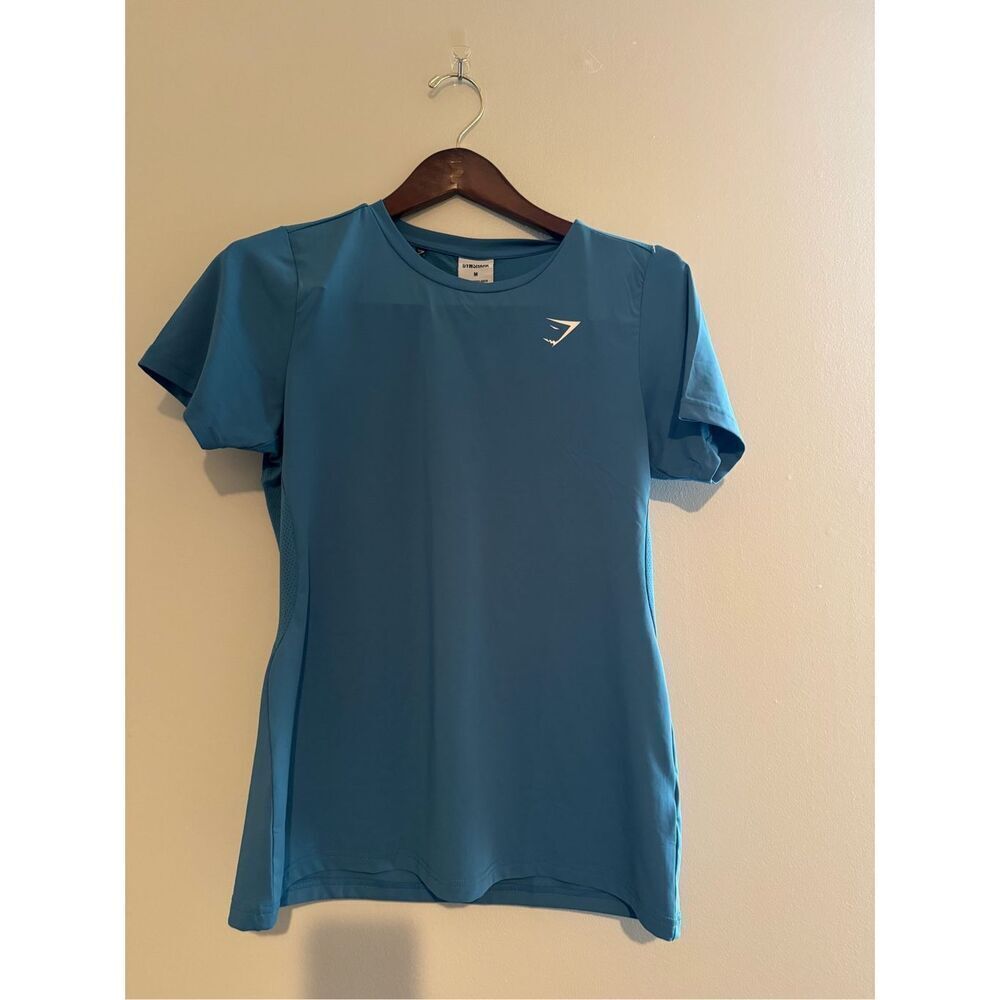 Gymshark women’s blue athletic top, mesh top size like medium - LIKE NEW